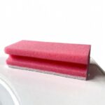 schuurspons rood met handgreep en witte schuurpad